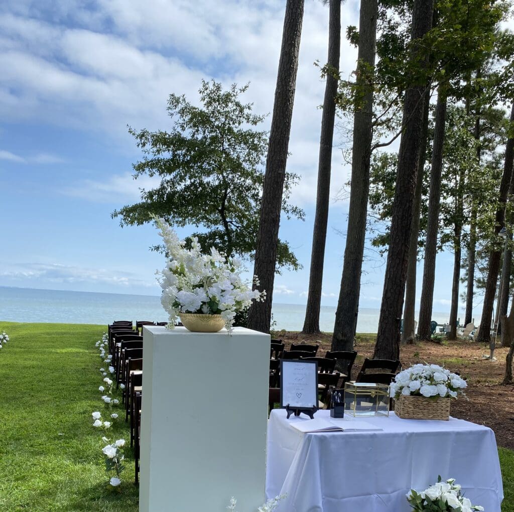 Welcome Table at the wedding Ceremony Site - Sign in well wishes book for guests